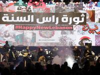 Lebanese band "The Great Departed" performs during new year's celebrations in downtown Beirut on December 31, 2019. ANWAR AMRO / AFP