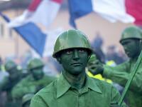 Masked revellers take part in a carnival procession through the south-western North Macedonian village of Vevcani, on January 13, 2020. The Vevcani carnival is 1.400 years old and is held every year on the eve of the feast of Saint Basil (January 14), which also marks the beginning of the New Year according to the Julian calendar, observed by the Macedonian Orthodox Church. Robert ATANASOVSKI / AFP