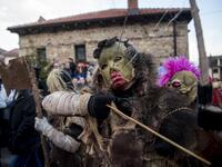 Masked revellers take part in a carnival procession through the south-western North Macedonian village of Vevcani, on January 13, 2020. The Vevcani carnival is 1.400 years old and is held every year on the eve of the feast of Saint Basil (January 14), which also marks the beginning of the New Year according to the Julian calendar, observed by the Macedonian Orthodox Church. Robert ATANASOVSKI / AFP