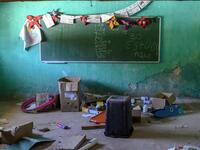 View of a classroom at an abandoned school in the village of El Paraiso de Tepila, Guerrero State, Mexico, on January 24, 2020. The Regional Coordinator of Community Authorities (CRAC-PF) vigilante group trains children as young as five near El Paraiso de Tepila so they can protect themselves from drug-related criminal groups operating in the area. Pedro PARDO / AFP