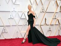 Charlize Theron wears chic custom made Dior gown