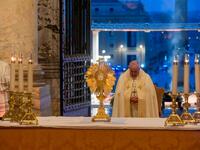 Pope Francis prepares to give the Urbi et orbi blessing after presiding over a moment of prayer on the sagrato of St Peter's Basilica, the platform at the top of the steps immediately in front of the facade of the church. (Photo: Vatican Media/AFP via Getty Images)