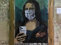 Italian artist TV Boy took to the image of Mona Lisa in his piece Mobile World Virus in Barcelona. (Facebook/ @tvboyofficial)