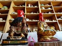 This picture taken on March 17, 2020 shows Taoist god statues after they were discarded by people not using them anymore, at the workplace of sculptor Lin Hsin-lai in Taoyuan, northern Taiwan. Every spare surface of Lin Hsin-lai's four-storey shop is crammed with a pantheon of Taiwan's celestial beings, testament to the decades he has spent sheltering and restoring unwanted statues of gods.  Sam Yeh / AFP