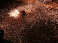 A Palestinian youth swings a homemade sparkler firework as people celebrate on a night of the Muslim holy month of Ramadan in Rafah refugee camp, in the southern Gaza Strip, on May 4, 2020. MAHMUD HAMS / AFP