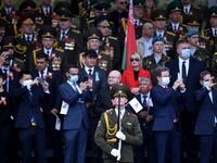 Guests attend a military parade to mark the 75th anniversary of the Soviet Union's victory over Nazi Germany in World War Two, in Minsk on May 9, 2020. Sergei GAPON / AFP