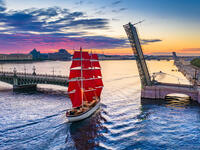 Saint Petersburg. White Nights. Cities of Russia. Panorama from the drone of the city of St. Petersburg. Scarlet Sails. White Nights in St. Petersburg. Divorced bridges. Sailboat with scarlet sails (Shutterstock) 