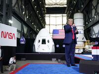 US President Donald Trump arrives to speak after the launch of the SpaceX Falcon 9 rocket and Crew Dragon spacecraft on NASA's SpaceX Demo-2 mission to the International Space Station from NASA's Kennedy Space Center in Cape Canaveral, Florida on May 30, 2020. Trump travels to Kennedy Space Center in Florida to watch the launch of the MANDEL NGAN / AFP
