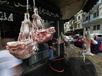 Sheep heads hang outside a butcher's shop in the Bab al-Tabbaneh neighbourhood of Lebanon's northern city of Tripoli on June 3, 2020. Thousands of residents of Lebanon's northern Tripoli struggle to put food on the table, as the country's worst economic crisis in decades has picked up in speed in recent weeks, with food prices rising by more than 70 percent since the autumn. Inflation has been a blow in the country where more than 45 percent of the country's population now lives below the poverty line, and 