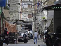 This picture taken on June 3, 2020 shows a view of an alley in the Bab al-Tabbaneh neighbourhood of Lebanon's northern city of Tripoli. Thousands of residents of Lebanon's northern Tripoli struggle to put food on the table, as the country's worst economic crisis in decades has picked up in speed in recent weeks, with food prices rising by more than 70 percent since the autumn. Inflation has been a blow in the country where more than 45 percent of the country's population now lives below the poverty line, an