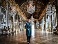 President of the Palace of Versailles (Chateau de Versailles) Catherine Pegard poses at the Galerie des Glaces (Hall of Mirrors) at the Chateau de Versailles (Palace of Versailles) in Versailles near Paris, on June 5, 2020, on the eve of it re-opening after 82 days of closure due to the novel coronavirus (COVID-19) outbreak. The Palace of Versailles -- France's big tourist attraction with nearly 10 million tourists a year - will open on June 6 with no US or Asia tourists who represent 30% of its visitors. S