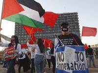Protesters gather in Tel Aviv's Rabin Square on June 6, 2020, to denounce Israel's plan to annex parts of the occupied West Bank. Israeli Prime Minister Benjamin Netanyahu has vowed to forge ahead with annexing settlements and the Jordan Valley, in line with the peace proposals unveiled in January by US President Donald Trump. The plan has been angrily rejected by the Palestinians, who say they were not consulted on proposals they see as capitulating to Israeli demands. JACK GUEZ / AFP