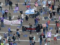 Protesters gather in Tel Aviv's Rabin Square on June 6, 2020, to denounce Israel's plan to annex parts of the occupied West Bank. Israeli Prime Minister Benjamin Netanyahu has vowed to forge ahead with annexing settlements and the Jordan Valley, in line with the peace proposals unveiled in January by US President Donald Trump. The plan has been angrily rejected by the Palestinians, who say they were not consulted on proposals they see as capitulating to Israeli demands. JACK GUEZ / AFP