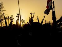 Members of the Hashed al-Shaabi (Popular Mobilisation) paramilitary force take part in a military parade in the southern Iraqi city of Basra on June 14, 2020, marking the sixth anniversary of its founding after Iraq's top Shiite cleric Grand Ayatollah Ali Sistani called to defend the country from the Islamic State group (IS). Hussein FALEH / AFP