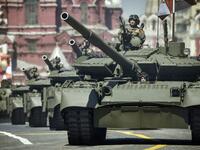 Russian T-72B3 tanks move through Red Square during a military parade, which marks the 75th anniversary of the Soviet victory over Nazi Germany in World War Two, in Moscow on June 24, 2020. The parade, usually held on May 9, was postponed this year because of the coronavirus pandemic. Alexander NEMENOV / AFP