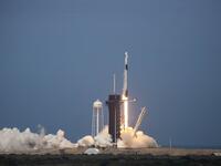 The SpaceX Falcon 9 rocket launches into space with NASA astronauts Bob Behnken (R) and Doug Hurley aboard the rocket from the Kennedy Space Center on May 30, 2020 in Cape Canaveral, Florida. The inaugural flight is the first manned mission since the end of the Space Shuttle program in 2011 to be launched into space from the United States. Saul Martinez/Getty Images/AFP 