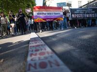 Protesters hold signs and banners as they take part in a demonstration called by feminist movements in Nantes, western France, on July 10, 2020, to denounce the nomination of French Interior Minister, facing rape accusations and French Justice Minister who criticised the #MeToo movement against sexual harassment. LOIC VENANCE / AFP