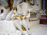 This photograph taken on July 14, 2020 shows a statue of an imaginary rabbit-like creature taking a selfie outside the Wat Pariwat Buddhist temple in Bangkok. Wat Pariwat, also known as "the David Beckham Temple", is decorated with statues of superheroes and comic characters as well as mythical and imaginary creatures. A golden-plated sculpture of the English football player holding the base of a Buddha statue in one of the buildings gives the temple its nickname. Mladen ANTONOV / AFP