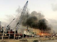 Lebanese media carried images of people trapped under rubble, some bloodied, after the massive explosions, the cause of which was not immediately known.  Layal ABOU RAHAL / AFP