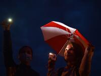 Opposition supporters rally to protest against disputed presidential elections results on Independence Square in Minsk on August 20, 2020. Sergei GAPON / AFP
