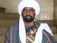 An Ashura re-enactor poses for a picture while dressed in costume as Shiite Muslims prepare to re-enact events of Ashura in the central Iraqi holy shrine city of Karbala on August 22, 2020. Ashura is a period of mourning in remembrance of the seventh-century martyrdom of Prophet Mohammad's grandson Imam Hussein, who was killed in the battle of Karbala in modern-day Iraq, in 680 AD. Mohammed SAWAF / AFP