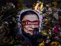 People left mementos in a makeshift memorial for Supreme Court Justice Ruth Bader Ginsburg in front of the US Supreme Court on September 19, 2020 in Washington, DC. Justice Ginsburg has died at age 87 after a battle with pancreatic cancer. Samuel Corum/Getty Images/AFP Samuel Corum / GETTY IMAGES NORTH AMERICA / Getty Images via AFP