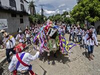 Members of the Afro-Mexican community take part in the annual festival dedicated to San Nicolas Tolentino, in Cuajinicuilapa, Guerrero state, Mexico, on September 10, 2020, amid the COVID-19 coronavirus pandemic. Although there are 1,5 million African descendants in a country of 128 million inhabitants, it is normal to hear that "in Mexico there are no blacks". PEDRO PARDO / AFP