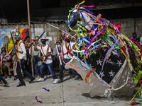 Members of the Afro-Mexican community perform the Toro de Petate dance in the annual festival dedicated to San Nicolas Tolentino, in Cuajinicuilapa, Guerrero state, Mexico, on September 9, 2020, amid the COVID-19 coronavirus pandemic. Although there are 1,5 million African descendants in a country of 128 million inhabitants, it is normal to hear that "in Mexico there are no blacks". PEDRO PARDO / AFP