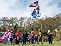 People dressed in political costumes participate in a contest during a Trump campaign rally named "Trumptoberfest" at Rocky Point Park in Warwick, Rhode Island on October 11, 2020. Many supporters dressed in political campaign clothing and waved flags while others dressed in festive costumes to take part in a political costume contest. Joseph Prezioso / AFP
