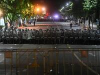 Riot police prepare to disperse pro-democracy protesters in Bangkok on October 15, 2020, after the government declared a state of emergency following an anti-government rally the previous day. Panumas SANGUANWONG / AFP