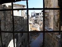Syrian workers take part in the reconstruction of Martini restaurant and hotel in the Jdaideh neighbourhood in Aleppo's Old City on October 17, 2020. AFP