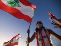 Hundreds marched in Lebanon's capital to mark the first anniversary of a non-sectarian protest movement that has rocked the political elite but has yet to achieve its goal of sweeping reform. ANWAR AMRO / AFP