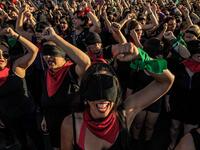 Women in Santiago, Chile, perform ‘Un Violador en tu Camino’ (A Rapist in your Path), a protest song that went viral and came to be used across South America, on 4 December 2019. Many wear red scarves & lipstick symbolizing the sexual nature of assaults, & are blindfolded in solidarity with people blinded by police.⁣ ⁣ From ‘Chile: The Rebellion Against Neoliberalism’ by Fabio Bucciarelli (@fabio_bucciarelli) for L’Espresso (@espressosettimanale).⁣