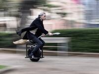 Alessandro Russo rides his "flying broom" on Halloween at Praca da Liberdade square, at Belo Horizonte, Brazil, on October 31, 2020. Russo developed a broom inspired by Harry Potter and the model is coupled to an electric unicycle and it is possible to run it at a speed of up to 60 km/h. DOUGLAS MAGNO / AFP