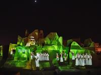 An animation is projected at the historical site of al-Tarif in Diriyah district, on the outskirts of Saudi capital Riyadh, on November 20, 2020. Saudi Arabia hosts the G20 summit on November 21 in a first for an Arab nation, with the downsized virtual forum dominated by efforts to tackle a resurgent coronavirus pandemic and crippling economic crisis. FAYEZ NURELDINE / AFP