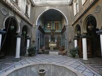 A view shows the courtyard of Naasan palace, a historical landmark, in the old part of Syria's capital Damascus on November 18, 2020. The old city of the Syrian capital is famed for its elegant century-old houses, usually two storeys built around a leafy rectangular courtyard with a carved stone fountain at its centre. While the capital has been largely spared the violence of Syria's almost ten-year war, several of these traditional homes have been abandoned by their owners or damaged in the conflict. AFP