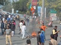 Bharatiya Janata Party supporters block a road during a 12-hour general strike in North Bengal called by BJP to protest against the West Bengal state government in Siliguri on December 8, 2020. Diptendu DUTTA / AFP