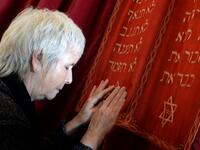  In this file photo taken on March 6, 2015, Fanny Mergui, a Moroccan Jewish woman, meditates as she visits Casablanca's Moroccan Jewish museum. Jewish history and culture in Morocco will now be part of the school curriculum -- a "first" in the region and in the North African country, where Islam is the state religion. Morocco's Jewish community has been present since antiquity and grew over the centuries, particularly with the arrival of Jews expelled from Spain by the Catholic kings after 1492. Fadel SENNA