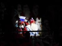 Russia's team fans dressed as Ded Moroz (Santa Claus or Father Frost) watch the Channel One Cup of the Euro Hockey Tour ice hockey match between Russia and Czech Republic at CSKA Arena in Moscow on December 19, 2020. Russia won the game 4-1.  Natalia KOLESNIKOVA / AFP