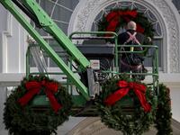 Christmas wreaths are installed at the White House on November 25, 2020 in Washington, DC. The White House is still planning Holiday parties despite federal and state warning about Covid-19 in the middle of a pandemic. Tasos Katopodis/Getty Images/AFP