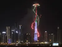 Fireworks are pictured in Dubai's Bourj Khalifa during New Year's Eve celebrations on December 31, 2020. Karim SAHIB / AFP