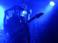 This picture taken on December 3, 2020 shows Andy Lin, a guitarist of Taiwanese death metal band 'Dharma' fixing his hair during a rehearsal in Taipei. Sam Yeh / AFP