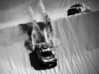 Mini's Spanish drivers Carlos Sainz of Spain and co-driver Lucas Cruz of Spain (L) overtake Toyota's driver Jakub Przygonski of Poland and his co-driver Timo Gottschalk of Germany (R) compete during Stage 3 of the Dakar Rally 2021 around Wadi Ad-Dawasir, in Saudi Arabia, on January 5, 2021. FRANCK FIFE / AFP