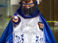 View of a doll displayed for sale at the ¨Nino Uribe¨ traditional Mexican store in Mexico City on January 27, 2021. ¨Nino Uribe¨ sells representations of the Baby Jesus called Baby COVID to raise awareness on the preventive measures to take amid the COVID-19 coronavirus pandemic. CLAUDIO CRUZ / AFP