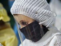 View of a doll displayed for sale at the ¨Nino Uribe¨ traditional Mexican store in Mexico City on January 27, 2021. ¨Nino Uribe¨ sells representations of the Baby Jesus called Baby COVID to raise awareness on the preventive measures to take amid the COVID-19 coronavirus pandemic. CLAUDIO CRUZ / AFP