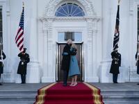 President Joe Biden and first lady Dr. Jill Biden hug as they arrive at the North Portico of the White House, on January 20, 2021, in Washington, DC. During today's inauguration ceremony Joe Biden became the 46th president of the United States. Alex Brandon-Pool/Getty Images/AFP