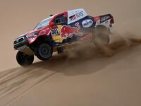 Toyota's driver Nasser Al-Attiyah of Qatar (R) and his co-driver Mathieu Baumel of France compete during the Stage 11 of the Dakar 2020 between Alula and Yanbu, Saudi Arabia, on Jan 14, 2021. (Photo: FRANCK FIFE / AFP)