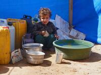 A Yemeni child sits at the Jaw al-Naseem camp for internally displaced people on the outskirts of the northern city of Marib, on February 18, 2021 in the Saudi-backed Yemeni government's last northern bastion. Until early last year, life in Marib city was relatively peaceful despite the Yemen's civil war that erupted in 2014. The United Nations warned last week of a potential humanitarian disaster if the fight for Marib continues, saying it has put "millions of civilians at risk". More than 3.3 million have
