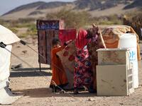 Yemeni children are pictured at the Jaw al-Naseem camp for internally displaced people on the outskirts of the northern city of Marib, on February 18, 2021 in the Saudi-backed Yemeni government's last northern bastion. Until early last year, life in Marib city was relatively peaceful despite the Yemen's civil war that erupted in 2014. The United Nations warned last week of a potential humanitarian disaster if the fight for Marib continues, saying it has put "millions of civilians at risk". More than 3.3 mil