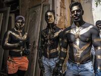 Carnival participants dressed in costume and wearing body paint 